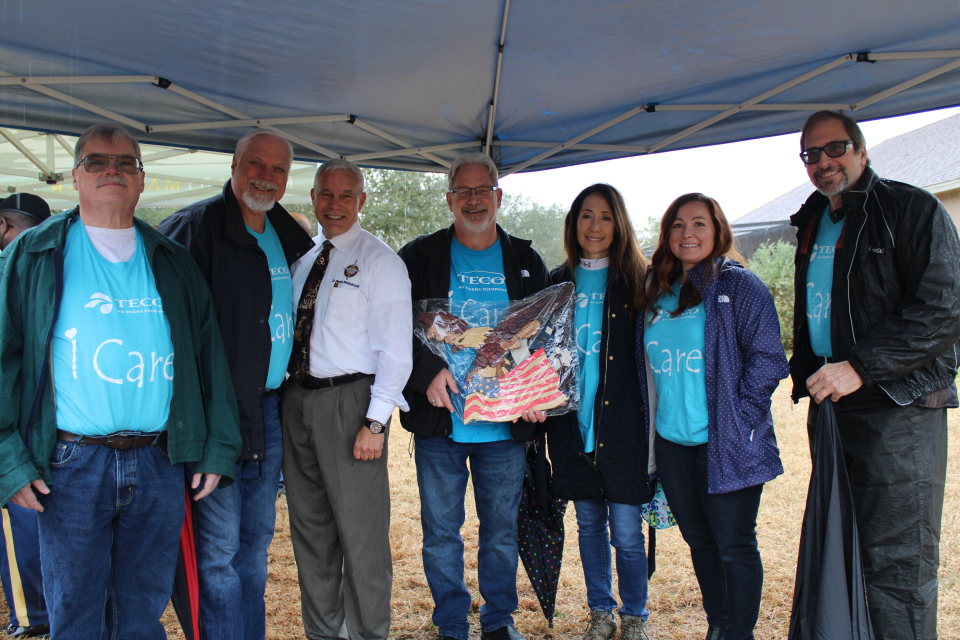 Don Wolford (far left) and TECO Veterans Alliance members volunteered to help breathe new life into a local veteran's home in 2022, as a part of Lifetime's Military Makeover show.